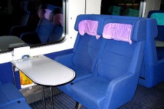 Interior from Ic3 trainset photographed 26. December 2004.   The Ic3 was built by ABB Scandia in Denmark. Each unit consists of 3 coaches. Built in a number of 92 trainsets. The trainsets were put in service in 1989 - 1998. 4 diesel engines of 294 kW per trainset. Max speed 180 km/h - 112 mph. Length 58 800 mm. Weight 97 metric tonnes. 16 seats 1st class, 128 seats 2nd class. Up to 5 trainsets can be put together.
